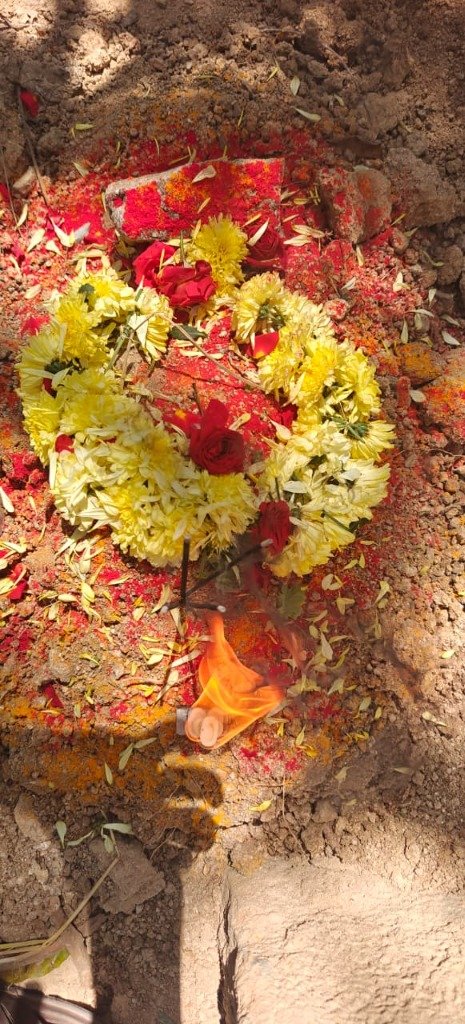 Dog burial ceremony setup with flowers, Surya Pets Funeral Yelahanka